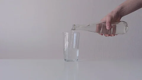 Water Being Poured Into Glass Stock Footage 89094400