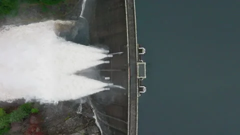 Water Being Pumped Through a Gravity Fed Hydroelectric Power Station Dam Stock Footage 170465724