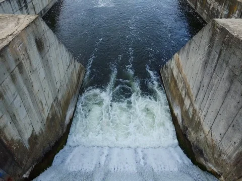 Water being released from a dam, water overflow Stock Footage 72567519