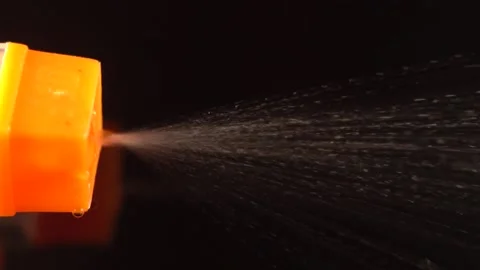 Water Being Sprayed In Slow Motion Stock Footage 149424217