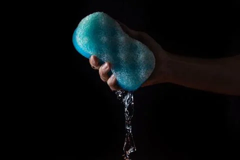 Water on a black background. Stock Photos