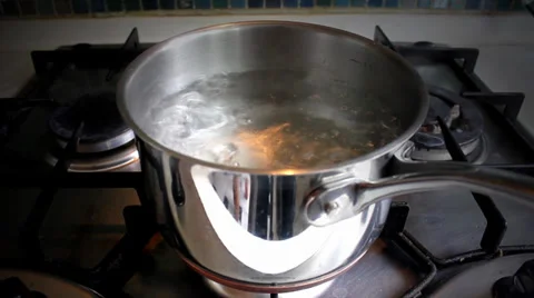 Water boiling away in pan Stock Footage 39327332