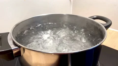 Water boiling, close-up in pot of boiling water Video stock 171526139