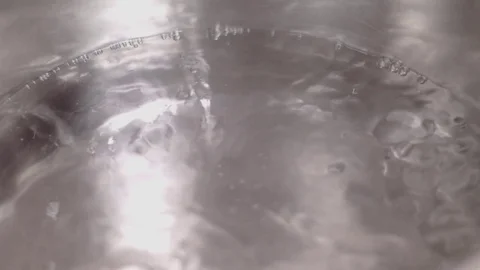 Water is boiling in a frying pan Stock Footage 84793742