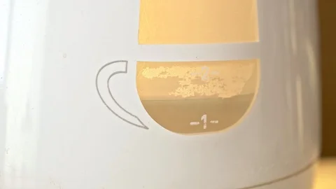 Water boiling in the kettle Stockbeeldmateriaal 115444668