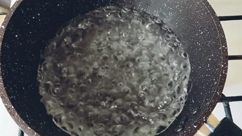 The water is boiling in the ladle Stock-Footage 158741614