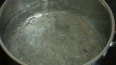 Water boiling in a pan Video stock 130591860