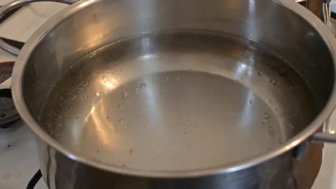 Water Boiling in Pot, Close-Up Bubbling Cooking Process Stock Footage 336866988