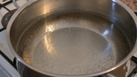 Water Boiling in Pot, Close-Up Bubbling Cooking Process Stock Footage 336867114