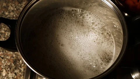 Water boiling preparing for pasta Stock Footage 93327642