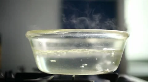 Water boiling in a saucepan Stock Footage 8552981