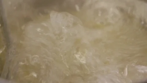 Water boiling with spaghetti Stock Footage 77046439