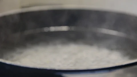 Water boiling,Close-up in pot of boiling water,Bubbles of boiling water Stock Footage 119085676