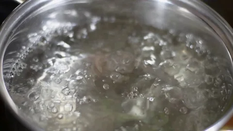 Water boils in a pan. Macro Stock Footage 123201870