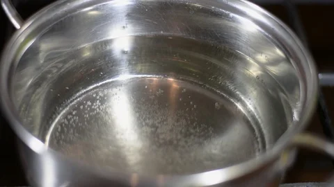 Water boils in a pan, time laps. Faster shooting Stock Footage 123201859