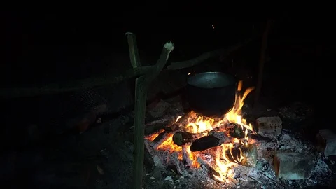 Water boils in a pot on the fire Stock Footage 108338007