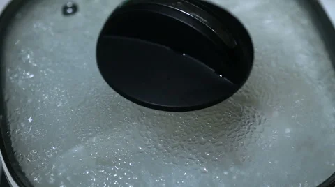 The water boils in a pot Видео 60450537