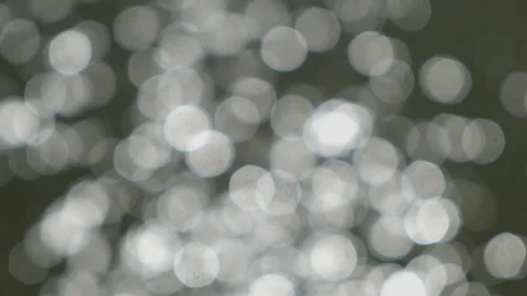 Water bokeh dots reflected by sunlight Stock Footage 291461800