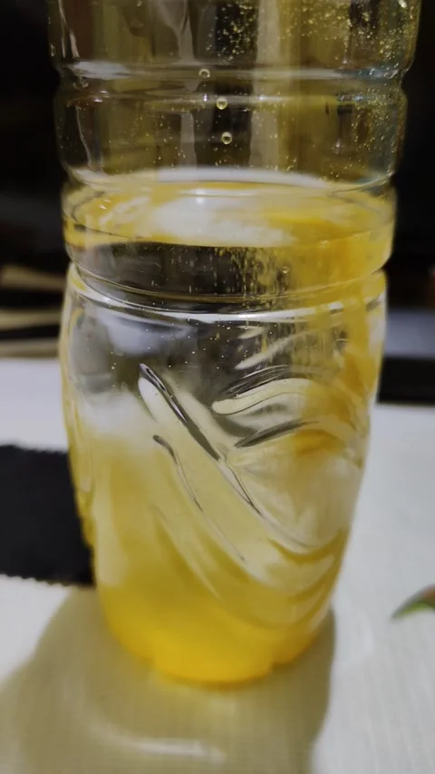 Water in the bottle changes color Stock Footage 287518170