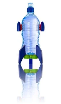 Water bottle in the form of a rocket with reflection Stock Photos