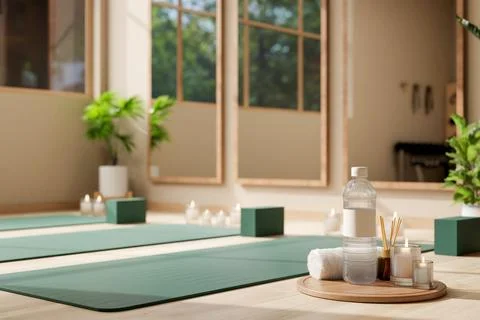Water bottle with towel and diffuser on wooden tray aside green mat across .. Illustrazione stock