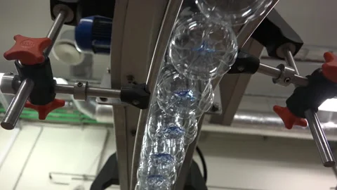 Water Bottles in a bottle factory Stock Footage 239705202