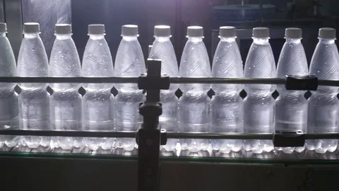 Water bottling line for processing and bottling pure spring water Stock Footage 80140736