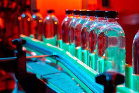 Water bottling line for processing and bottling pure spring water Stock Photos