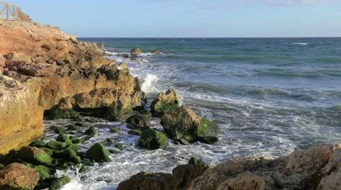 Water breaking in rocks Stock Footage 45596455