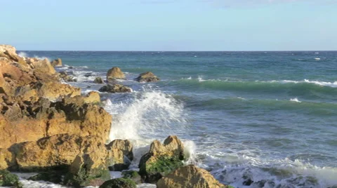 Water breaking in rocks Stock Footage 45596715