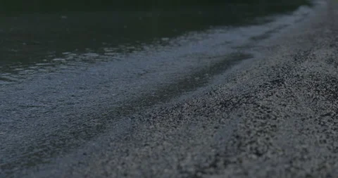 WATER BREAKING ON SHORE Stock Footage 230996093