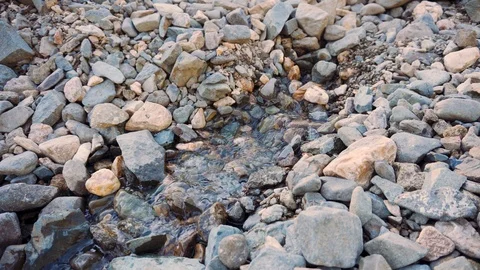 Water breaks out of the ground Stock Footage 111570300