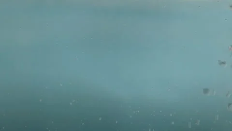 Water bubble on blue Stock Footage 257120149