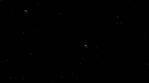 Water bubbles background on black background. Side view of beautiful chaotic Stock Footage 114001195