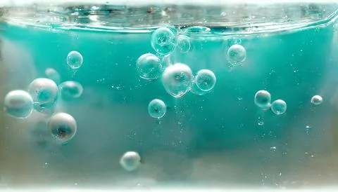 Water bubbles background. Macro photography. They break out from the bottom. Stock Illustration