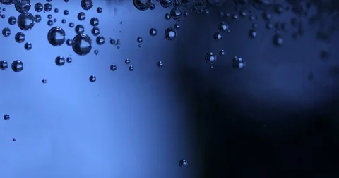 Water bubbles on black background, microscope look Stock Footage 104648649