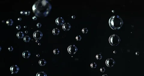 Water bubbles on black background, micro... | Stock Video | Pond5