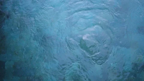 Water bubbles in blue pool, close up, 4K Video stock 120952430