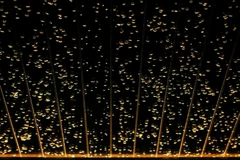 Water bubbles on a dark blue background. Stock Photos