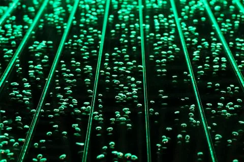 Water bubbles on a dark blue background. Stock Photos
