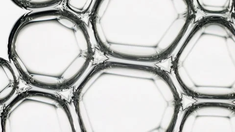 Water bubbles float past, science background for titles Stock Footage 77725611