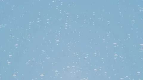 Water bubbles floating from bottom. Stockbeeldmateriaal 132929427