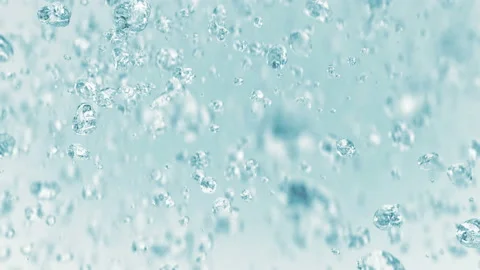 Water bubbles flying in super slow motion 4K Stockbeeldmateriaal 150996884