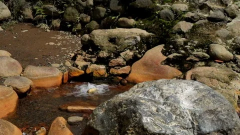 Water bubbles from a hot spring containing sulfur Video stock 292672586