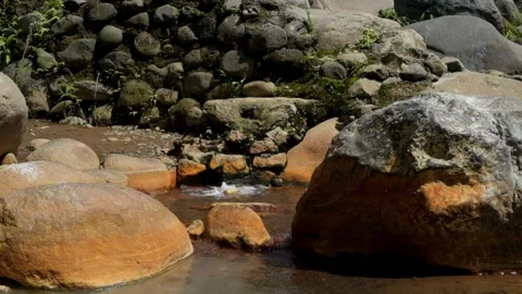 Water bubbles from a hot spring containing sulfur Видео 292672588