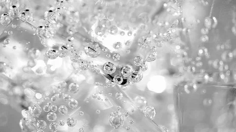 Water bubbles in ice water Stock Footage 104518423