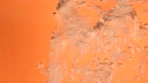 Water bubbles on orange Stock Footage 257120390