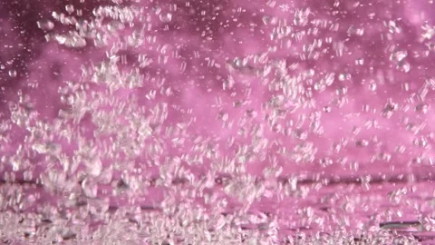 Water bubbles pink background Stock Footage 229649852