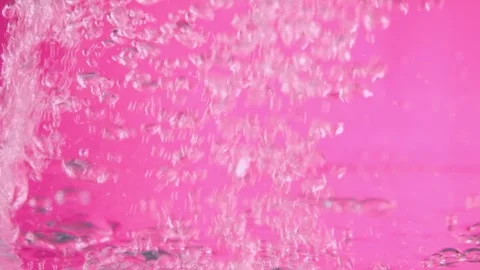 Water bubbles on pink background Stock Footage 249209648