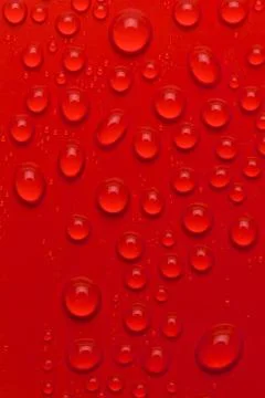 Water bubbles on red background Stock Photos